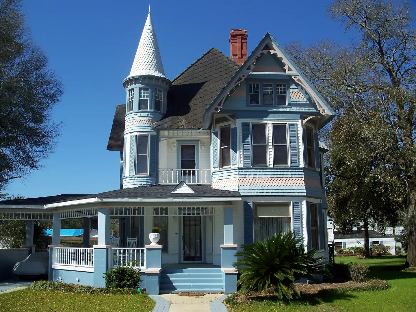 A house in the DeFuniak Springs Historic District in DeFuniak Springs, Florida. It is on Circle Drive, the road that goes around Lake DeFuniak, at the heart of the district.